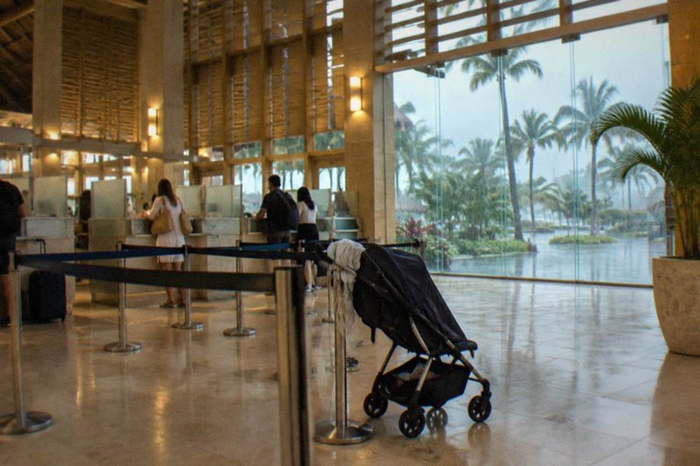 Immigration counters under warm lighting in a tropical airport terminal